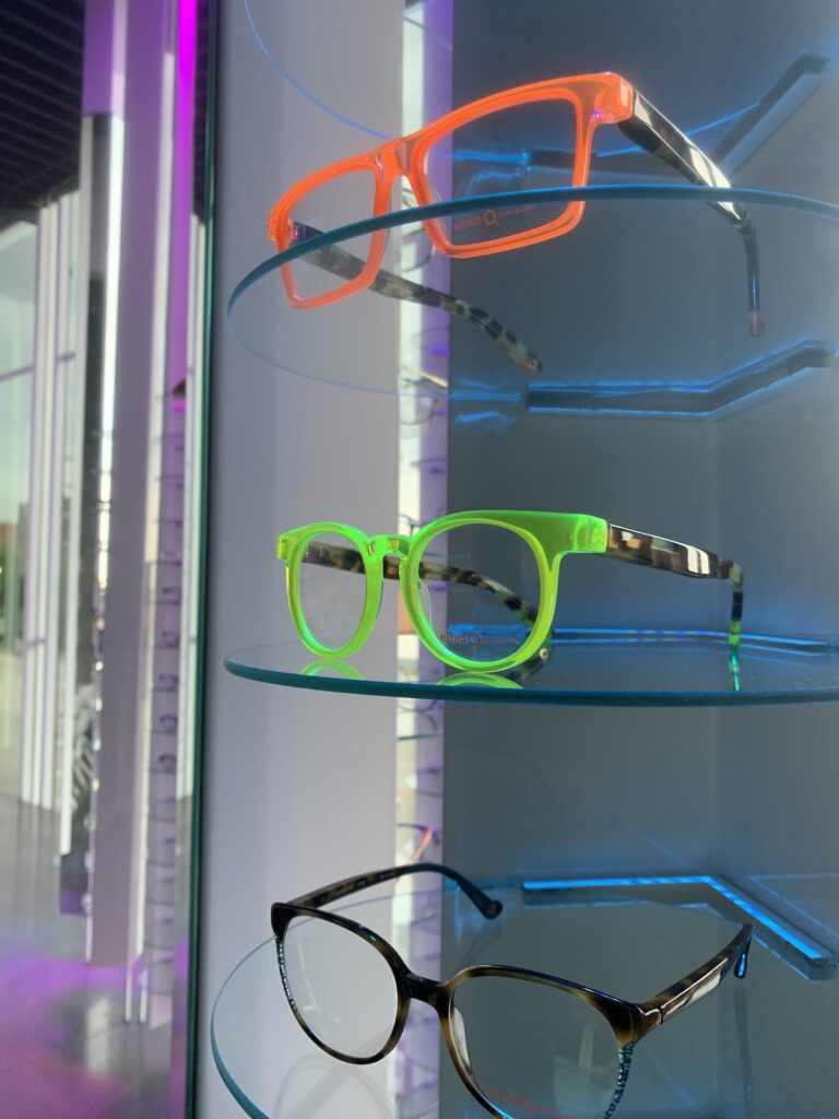 Three different colour glasses frames at CHROMA in Fort Worth.